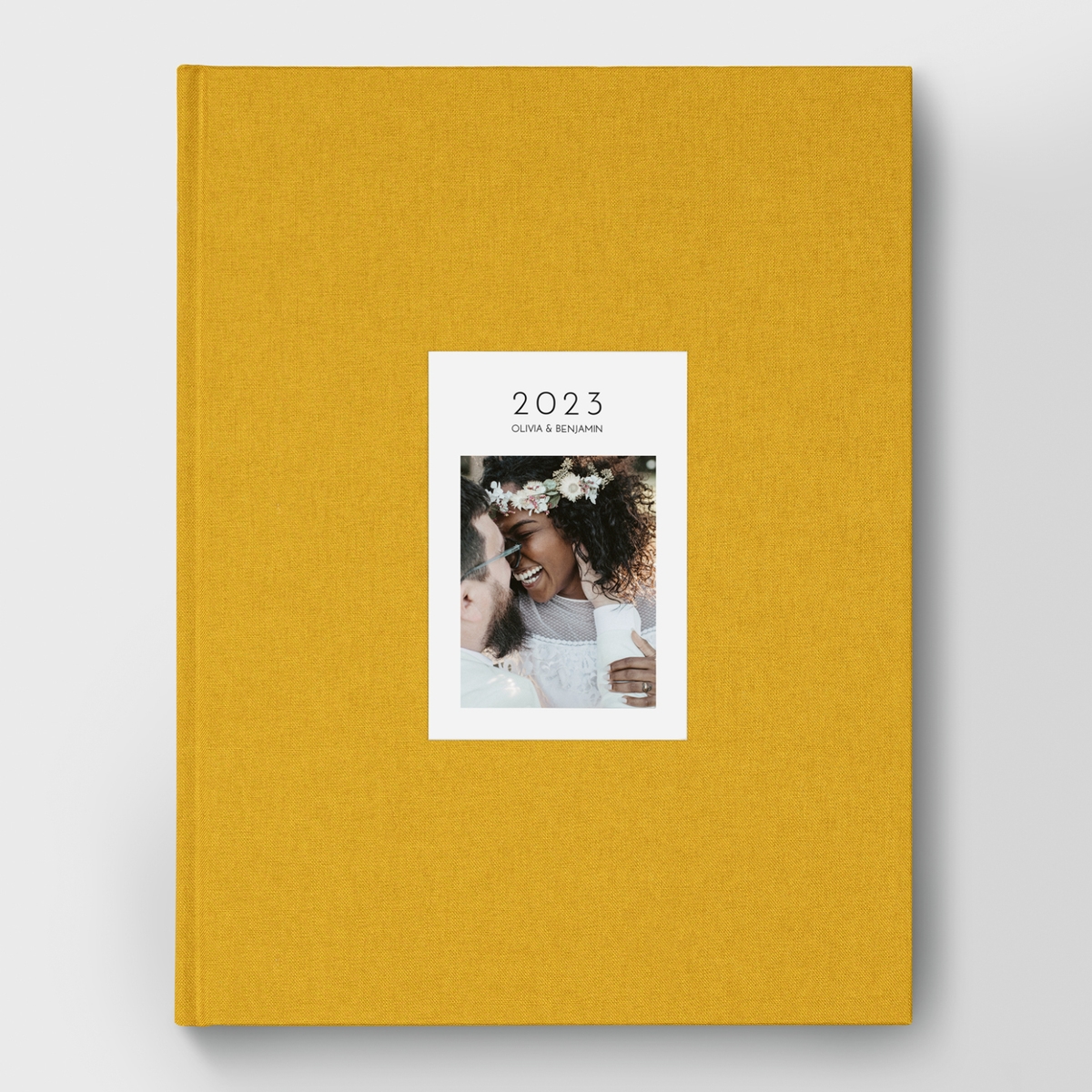 Livre photo couverture tissu photo embossée